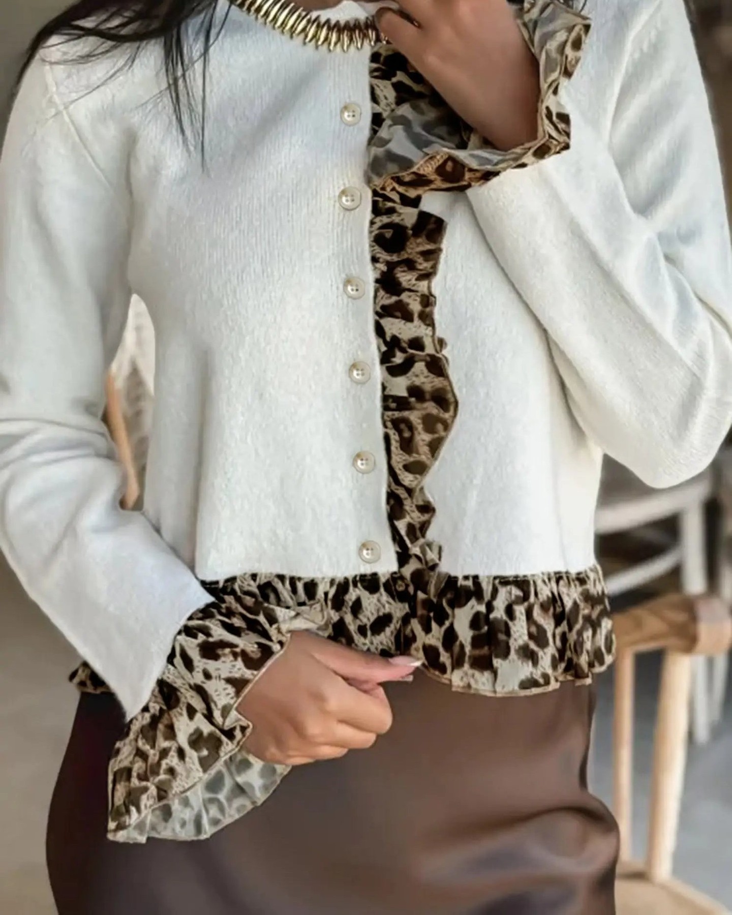 This cardigan is not just a piece of clothing; it’s a statement! 

With its bold leopard patchwork ruffles and soft stretch body, this cropped cardigan adds a touch of fierce femininity to any outfit. 

Layer it over your favorite bodysuits or blouses for a chic look that turns heads. 

 

#AutumnFashion #Knitwear #UKStyle #LeopardPrint #FashionFit
