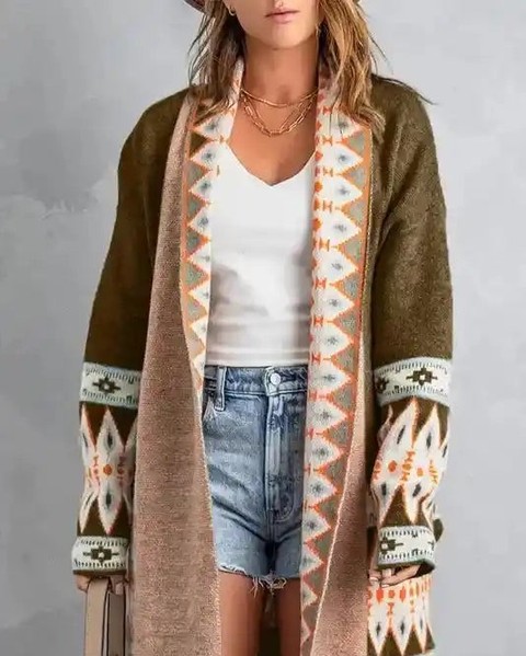 Who knew cozy could look this chic? 

Wrap yourself in the warmth of bohemian elegance with our Aztec Print Duster Cardigan.

Crafted from a soft acrylic-nylon-rayon blend, this piece adds a dramatic longline silhouette to your outfit while keeping you snug. 

Whether you lean towards rich blue or warm brown, it’s the perfect layering piece for those breezy days ahead. 

Available now for £35.46. 

Don’t miss out on this must-have addition to your wardrobe!

#Fashionfitz #BohoStyle #CardiganSeason #NewIn #CasualChic