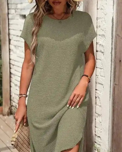 Meet your new wardrobe favorite! 💚✨

The Jungle Green Waffle T-shirt Dress is the perfect mix of comfort and style. 

Dress it up or down for any occasion—it's a must-have for every fashionista! 🌿👗
