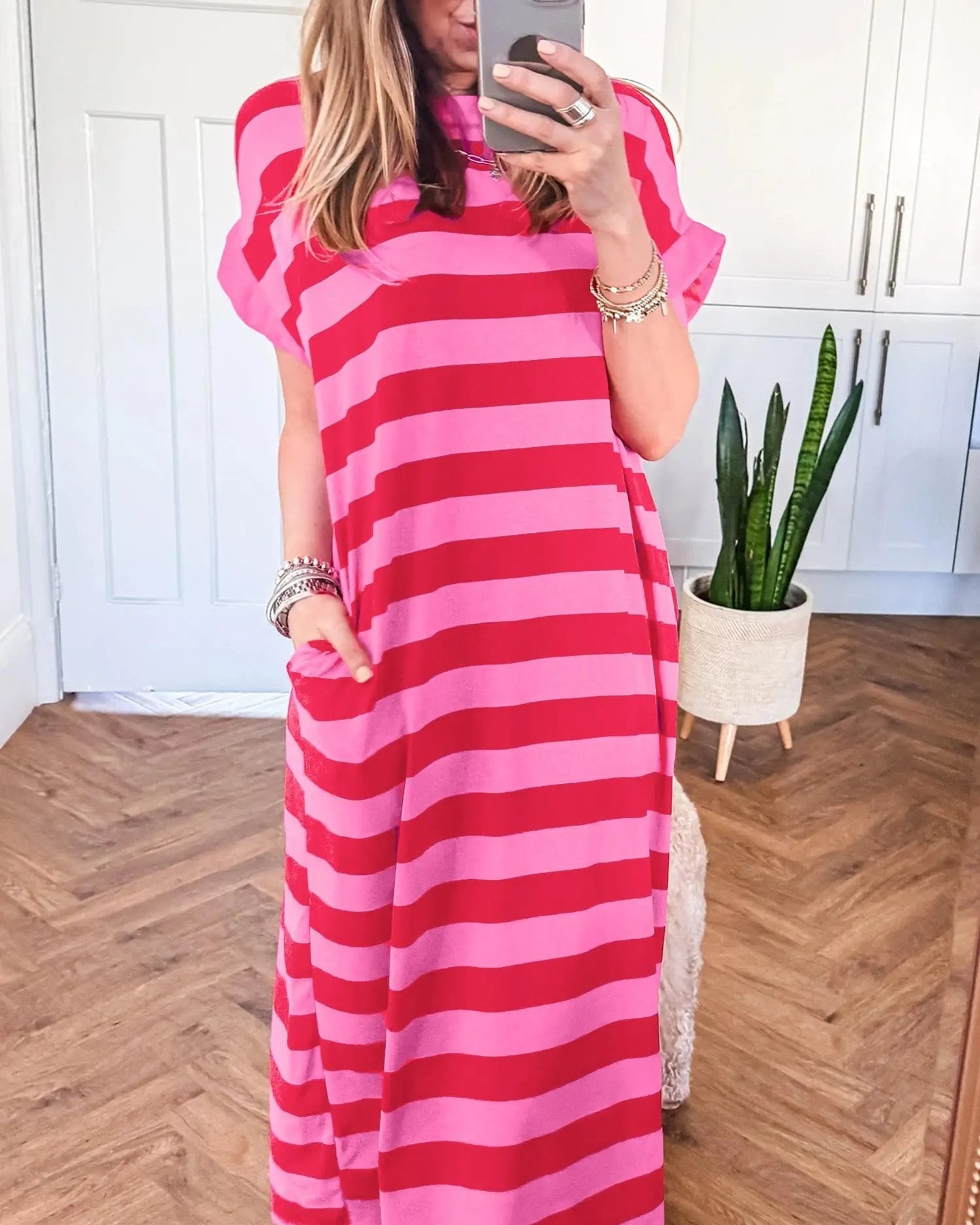 How many pockets do you need to live your best summer life? 🌸 

Meet the Stripe Cuffed Short Sleeve Pocketed Maxi Dress—where comfort meets style! 

Imagine your go-to T-shirt transformed into a chic, full-length dress. With its soft rose and neutral stripes, this dress brings effortless charm to any outing. 

Short cuffed sleeves and handy side pockets mean you can move freely while looking fabulous. 

Perfect for sunny days or casual nights, you’ll want to wear this on repeat. 

Grab yours now for just £23.07! 

#Fashionfitz #SummerStyle #MaxiDress #CasualChic #FashionDeals