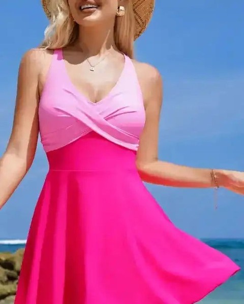 Summer is just around the corner, and it's time to find your perfect swimwear! 🌊✨ 

The Pink Crisscross Straps Flared Swim Dress is here to elevate your beach look with elegance and comfort. Get ready to make a splash! 💖