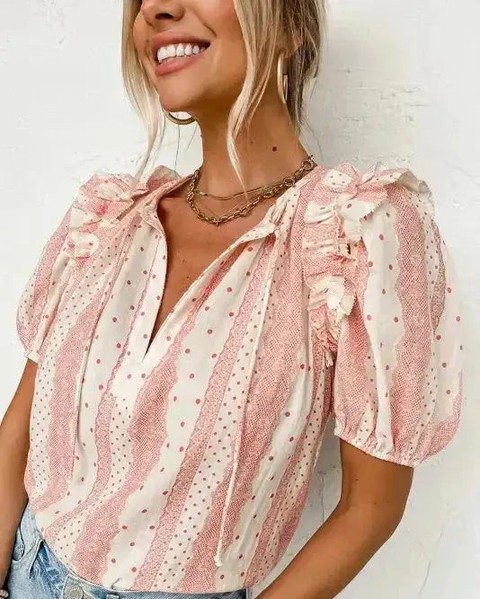 Elevate your wardrobe with the Chic Peek Puff Sleeve Blouse in polka dot! ✨ 

This versatile piece is perfect for any occasion—dress it up or down, you'll always look fabulous! 

Don't wait to add this stylish staple to your collection! 💖