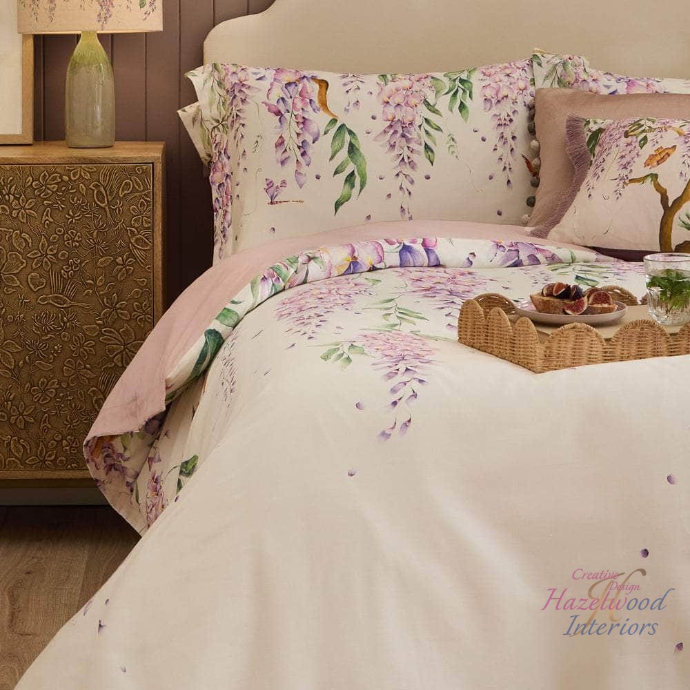 Imagine drifting off to sleep surrounded by dreamy wisteria florals! 🌸💤 

Transform your bedroom into a serene escape with our Mariposa Printed Duvet Cover Set. 
Soft purples and lilacs create a romantic vibe, while the reversible design offers a gentle blush pink for those days when you want a change. 

Crafted from premium cotton blend, it promises a breathable and cozy night. Why settle for ordinary when you can bring art into your space? 

Now at €69,00! 
https://ssdlr.shop/l/489994cf 

#BeddingGoals #FloralDreams #HomeDecor #CozyNights #VoyageMaison