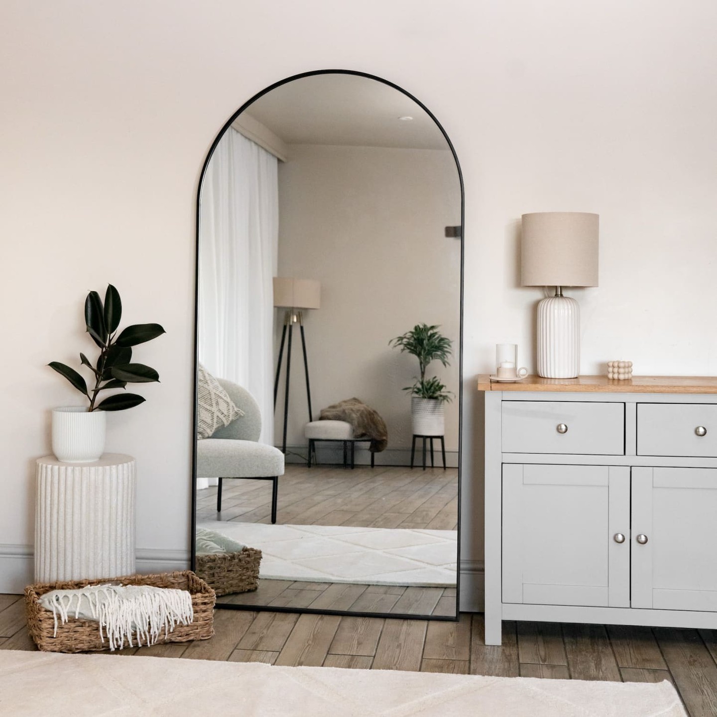 Mirror, mirror on the wall… 
Is it time for an upgrade? 💫 

Meet the Akiko Black Arched Mirror — where elegance meets function. 
This stunning 180cm x 90cm piece is more than just a reflection; it's a statement. 

Its sleek matte black frame and graceful half-moon arch add sculptural beauty to any room. Perfect for making spaces feel larger and brighter, this mirror is a game-changer for your interior. 

Available now for £239.95. 
Transform your home with a touch of modern minimalism! 

🖤 #HomeDecor #InteriorDesign #ArchedMirror

https://jobuhome.com/products/akiko-full-length-black-metal-arched-mirror-180cm-x-90cm