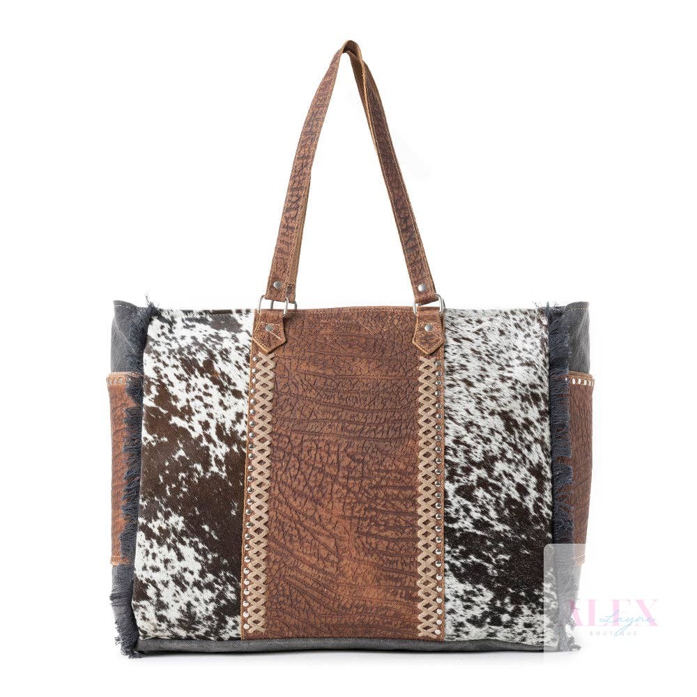 Ready to make a statement on your next adventure? 

The Saddle Belle Weekender Bag in Wild Clay is your perfect travel companion! With its unique hairon hide front and spacious design, you can pack all your essentials in style. 

Don’t just travel—travel boldly! 

https://v6nuz8ufkh0isis5-56107663554.shopifypreview.com/products_preview?preview_key=7078ab70d9993fe986d7cecf215a91da 

#WeekenderBag #TravelInStyle #RINNRIVER #FashionForward #MomEssentials