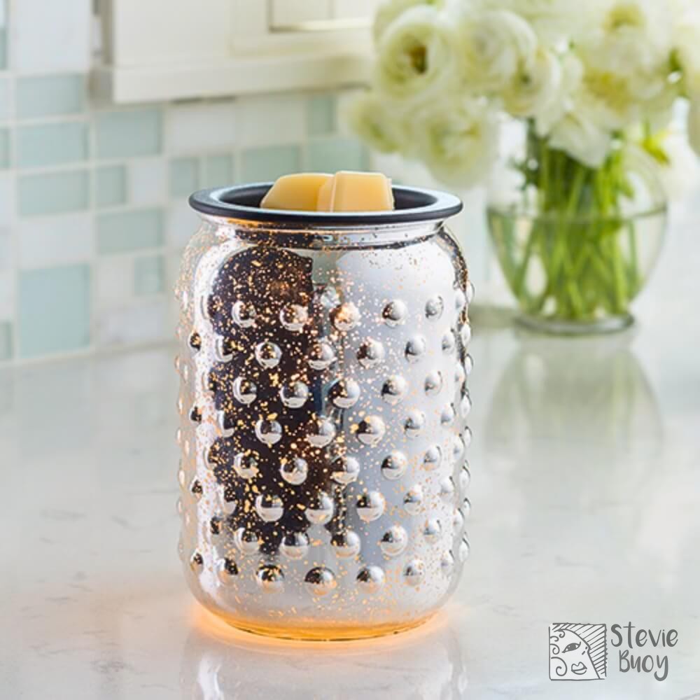 Ever wondered how to create that cozy, candlelit vibe without the fuss? 🕯️✨ 

Meet the Silver Mercury Glass Illumination Warmer. With its stunning hobnail pattern, it glows beautifully when lit, filling your space with fragrance and charm. 

Ditch the flame and soot. Embrace the elegance of a warm ambiance that complements your style and elevates your home decor. 

Transform your space and enjoy your favorite wax melts—just like magic! 

Available now for $54.95. 

https://ssdlr.shop/l/b096c214

#HomeDecor #CandleWarmers #Aromatherapy #CozyVibes #StevieBuoy