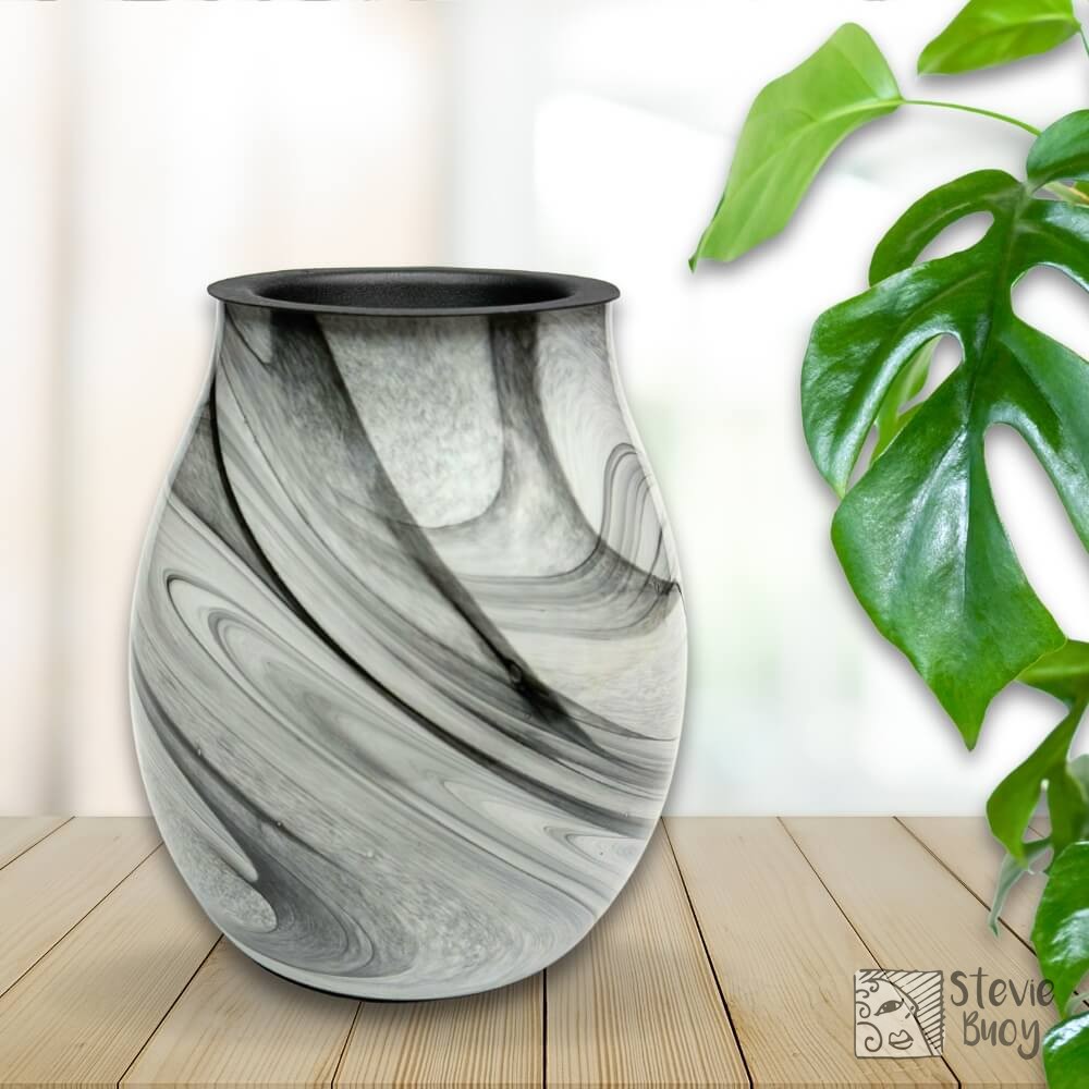 Turn your space into a fragrant oasis! 🌿✨ Our Monochrome Glass Heat Pad Wax Warmer combines elegance and functionality for the ultimate sensory delight. 

🌟 Key Features:
- Hand-blown glass design for a stunning look
- LED lights create a cozy ambiance
- High-quality heat pad for safe wax melting
- No flame, smoke, or soot! 
- Comes with a reusable silicone dish liner for easy cleanup 😉

All this for just $39.95! 

Transform your home today: https://ssdlr.shop/l/b47245d2

#HomeFragrance #WaxWarmer #CozyVibes #InteriorDesign #ScentedSpaces