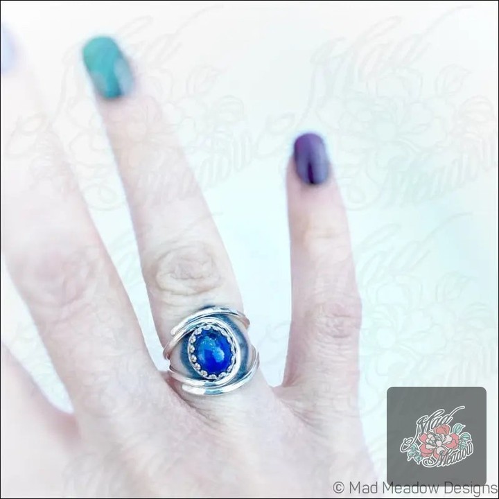 Dare to be bold with your accessories? 

Our Lapis Lazuli Adjustable Sterling Silver Ring is not just a piece of jewelry—it's a statement of your unique style! 

Crafted for comfort with its adjustable wrap design, this ring fits most fingers perfectly. 

Feel the power of Lapis Lazuli as it enhances intuition, clarity, and honest expression. 

Why blend in when you can stand out? Grab yours now for only $85.00!

Shop here: 

#BohoStyle #GemstoneJewelry #LapisLazuli #MadMeadowDesigns #UniqueAccessories