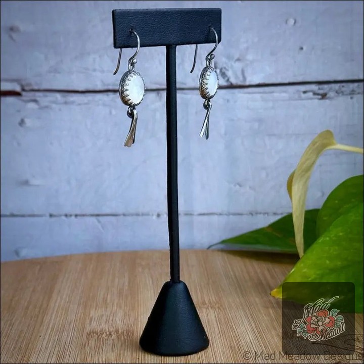 Ever feel like you need a little celestial magic in your life? 

Meet our Moon Goddess White Silver Earrings—crafted to connect you to the cosmos. 

These whimsical beauties feature shimmering white mother of pearl, elegantly hung in a hammered silver design. 

Not just a style statement, these earrings are believed to enhance your intuition and attract prosperity while wrapping you in a comforting embrace. 

Let your imagination soar with each reflective dangle. 

Now at $155.00, they're your new go-to for that enchanting touch. 

Shop here: 

#MoonGoddess #CelestialJewelry #BohoStyle #MotherOfPearl #MadMeadowDesigns