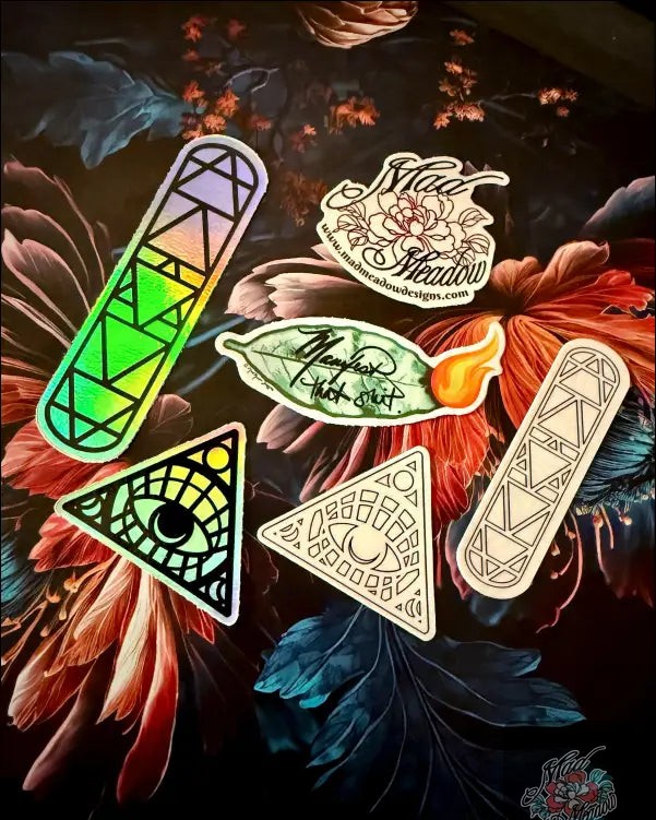 ✨ Unleash your inner magic with our FIVE Sticker Bundle! ✨ Add a sprinkle of mindfulness and creativity to your life with this enchanting pack perfect for journals, laptops, or water bottles! 

🌀 What's inside? 
- 🔥 Manifest That Sh*t (bay leaf design)
- 🌌 Elemental stickers (2 styles: Coloring Book & Iridescent)
- 🔮 All-Seeing Eye stickers (2 styles: Coloring Book & Iridescent)
- 🎁 BONUS: One free Mad Meadow sticker! 

Now only $10.50! Grab yours before the magic fades! ✨🛒 

#MadMeadowDesigns #StickerBundle #Manifestation #Creativity #GoodVibes 

https://ssdlr.shop/l/e7a13fe6