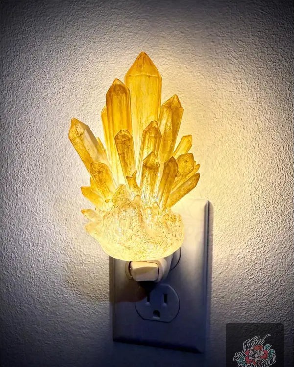 Did you know your space can glow with magic? ✨ 

Transform any corner into a mystical sanctuary with our Citrine Crystal Point Night Light. Its enchanting golden hue casts a calming glow, perfect for setting the mood at bedtime or during meditation. 

Just plug it in and let the tranquility flow! 

 

#Citrine #NightLight #BohoStyle #WitchyVibes #HomeDecor