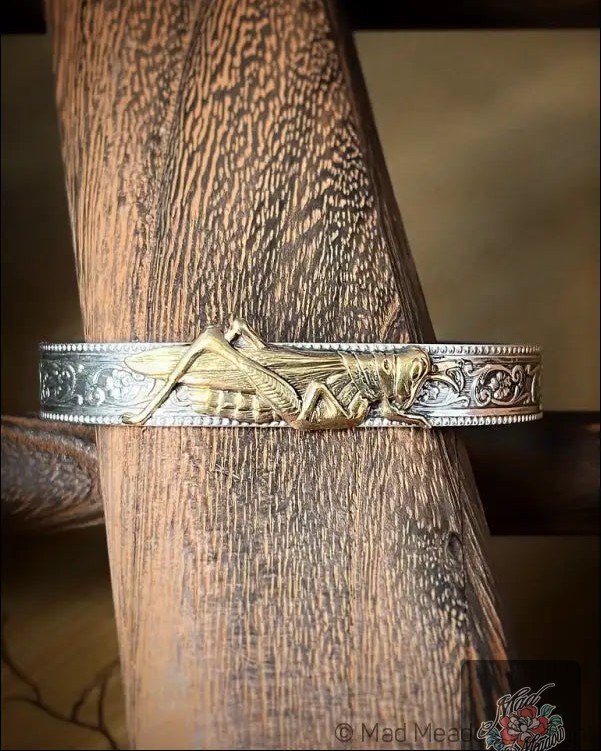 Who says jewelry can't be fun? 

This Sterling Silver Cuff Bracelet with a playful grasshopper accent is here to add a whimsical touch to your style! 

Perfect for daily wear, it combines elegance with a hint of nature. Elevate your outfit with a piece that sparks joy! 

 

#WhimsicalJewelry #NatureInspired #BraceletLove #AnimalJewelry #MadMeadowDesigns