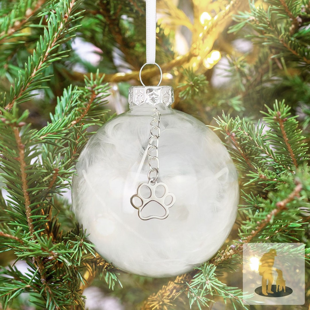 Did you know that a single ornament can hold a lifetime of memories? 🎄✨

This beautiful glass bauble, filled with delicate white feathers, is not just for decoration—it’s a heartfelt tribute to your beloved pet. It features a charming paw print charm that reminds you of the love you've shared every Christmas.

Celebrate their spirit and keep them close this festive season. 

Available now for £9.99.

https://ssdlr.shop/l/0962a8a3

#PetMemorial #HolidayKeepsake #RememberYourPet #ChristmasOrnaments #ForeverInOurHearts