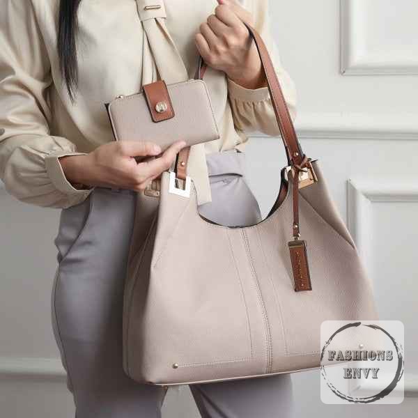 Who says you can't have style and functionality in one bag?

The MKF Estelle Shoulder Bag is your new go-to companion. With its spacious main compartment and organized pockets, you’ll have everything you need right at your fingertips. Plus, the matching wallet keeps you chic and coordinated.

Upgrade your bag game today!

#CuteHandbag #DesignerHandbag #NewArrivals #FashionFinds #StatementHandbag