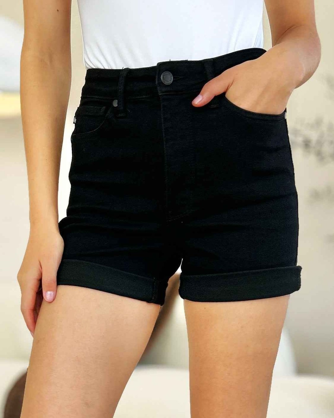 Judy Blue Full Size High Waist Tummy Control Cuffed Denim Shorts
 49.0 USD

 These High Waist Tummy Control Cuffed Denim Shorts are the perfect addition to any summer wardrobe. With their high waist design, they provide extra coverage and support, helping to create a slimming and flattering effect on the stomach area. The cuffed hem adds a stylish touch, making these shorts versatile enough to be dressed up or down for any occasion. Made from quality denim fabric, they are comfortable and durable, ensuring long-lasting wear. Don't compromise on style or comfort – these shorts have it all!
 Style #: 150237
 
Features: Basic style
Stretch: Slightly stretchy
Material composition: 93% cotton, 6% polyester, 1% spandex
Care instructions: Machine wash cold. Tumble dry low.
Imported
 

Size
Bust
Waist
HIP

0/24
N/A
24
33

1/25
N/A
25
34

3/26
N/A
26
35

5/27
N/A
27
36

7/28
N/A
28
37

9/29
N/A
29
38

11/30
N/A
30.5
40.5

13/31
N/A
32
42

15/32
N/A
33.5
43.5

14W
N/A
34
44.5

16W
N/A
35.5
45.5

18W
N/A
37.5
47.5

20W
N/A
39.5
49.5

22W
N/A
41.5
52

24W
N/A
43.5
54.5

S
36
26-27
34-35

M
38
28-29
36-38

L
40
30-31
39-40.5

XL
N/A
32.5-34
42-43.5

1XL
46
34.5-35.5
44.5-45.5

2XL
48
37.5
47.5

3XL
50
39.5
49.5

 https://fashionsenvy.com/products/judy-blue-full-size-high-waist-tummy-control-cuffed-denim-shorts
