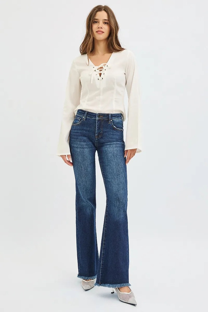 Meet your new favorite jeans that make you feel as good as you look! 🌟 These RISEN Flare Jeans blend retro-chic vibes with modern comfort. With their mid-rise design and tummy control, they smooth your silhouette while keeping you cozy all day. Perfect for a casual brunch or a night out, they're the wardrobe staple you'll reach for again and again. Slip into these dark wash beauties and embrace that 'I feel fabulous' energy—because confidence starts with the right fit! ✨ #Flare Jeans #Tummy Control #Retro Fashion #Denim Love #Mid Rise Jeans