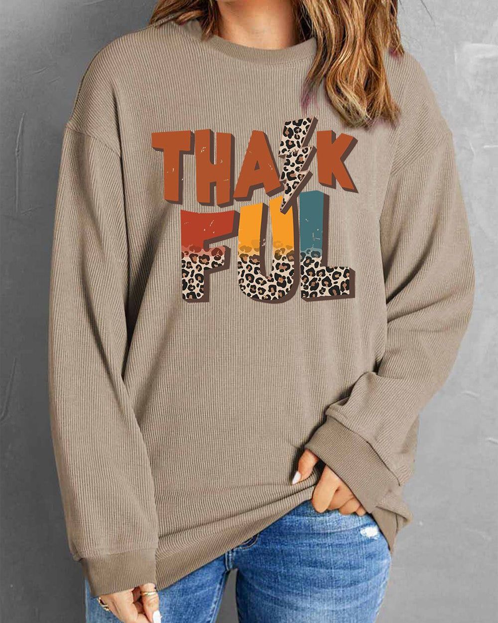 Letter Graphic Round Neck Long Sleeve Sweatshirt
 45.0 USD

 
Features: Basic style
Sheer: Opaque
Stretch: No stretch
Material composition: 100% polyester
Care instructions: Machine wash cold. Tumble dry low.
Imported
 

Size
US
Bust
Shoulder
Sleeve Length
Top Length

S
4
41.7
21.7
22.4
29.3

M
6/8
44.1
22.8
22.6
30.1

L
10/12
46.5
24
22.8
30.9

XL
14/16
49.6
25.6
22.8
31.7

2XL
18
52.8
27.2
22.8
32.5

 https://fashionsenvy.com/products/letter-graphic-round-neck-long-sleeve-sweatshirt-2