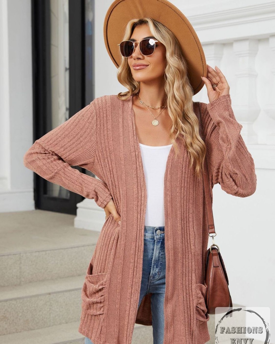 Cozy up in style without compromising on comfort! 

Our Pocketed Open Front Long Sleeve Cardigan is your new go-to for effortless elegance. With soft, breathable fabric, it’s perfect for layering or lounging.

Complete with pockets for your essentials, this cardigan brings both function and flair to your wardrobe. 

Why settle for ordinary when you can have extraordinary? 
Now at $28.90, it's the stylish upgrade you've been waiting for.

Grab yours today! 

#FashionFinds #CozyChic #StyleEssentials #NewArrivals #WardrobeUpdate