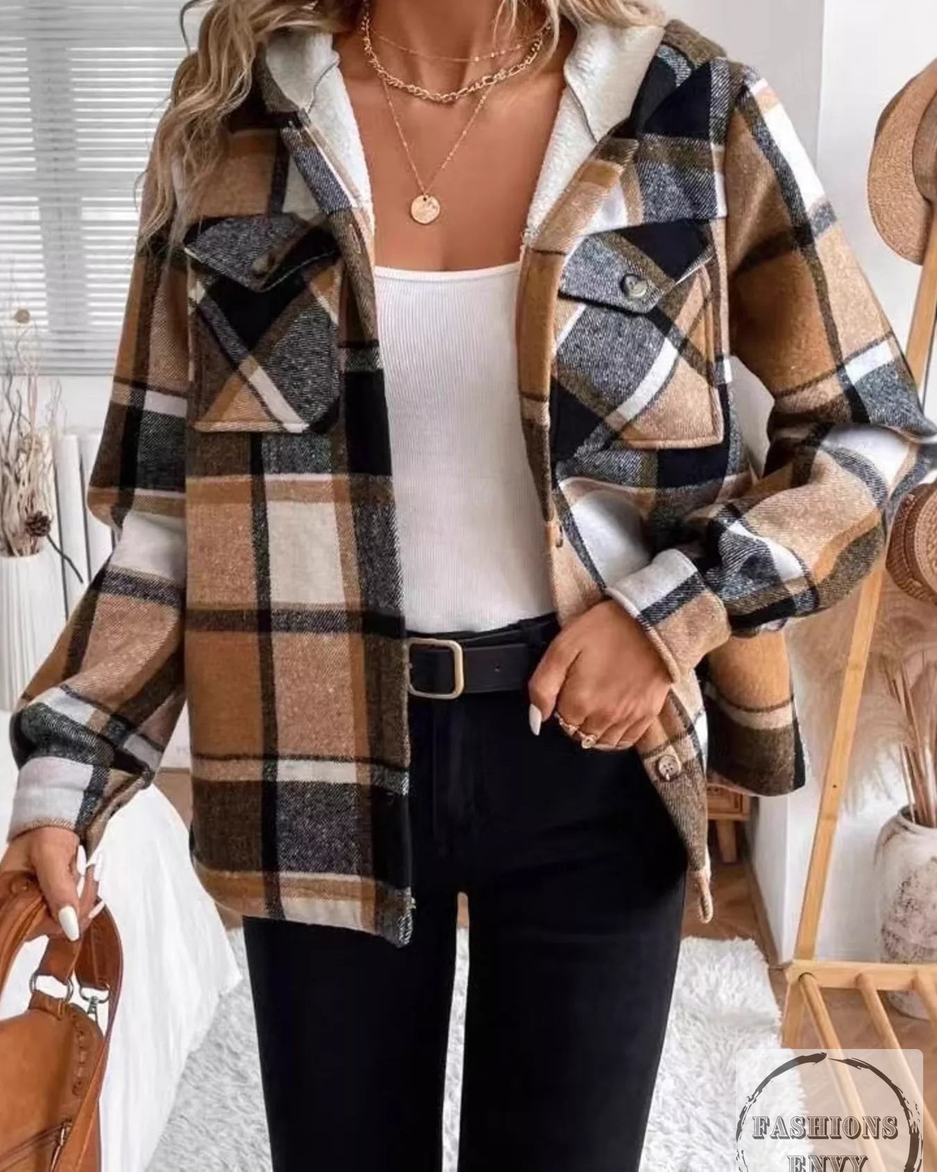 Is your wardrobe ready for a cozy revolution? 

Meet your new favorite layer: the Plaid Shacket! 

This hooded button-up is the perfect blend of comfort and style. 

Its timeless plaid pattern keeps you looking trendy while the plush lining wraps you in warmth. 

Functional pockets? Yes, please! 

With easy layering options, this shacket is all set for chilly days and casual outings. 

Snag it now for only $55.25 and redefine your everyday look! 

 

#PlaidShacket #FashionFinds #CozyVibes #LayeringEssentials #NewArrivals