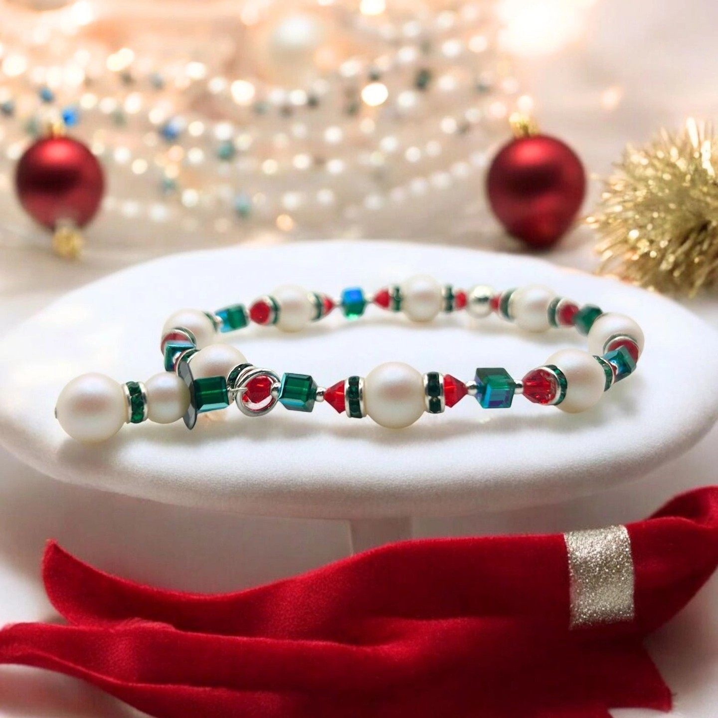 👉 Comment "Shop" order this item 👈

Sparkling Snowman Christmas Bracelet (Ready to Wear) 👇
Bring festive charm to your holiday wardrobe with our handcrafted Sparkling Snowman Christmas Bracelet. This elegant piece features luminous Swarovski 8mm Pearlescent Pearls perfectly paired with sparkling Light Siam red bicones and rich Emerald green crystal cubes, creating a stunning Christmas color palette. The premium components include genuine .925 sterling silver accents for lasting beauty. Completed Size: Up to 8 inches Materials: Swarovski 8mm Pearls Swarovski 4mm Light Siam Bicones Swarovski 4mm Emerald Cubes Emerald Rondells Sterling Silver 2mm Seamless Beads Sterling Silver Large Hole Bead Elastic Cord https://toocutebeads.com/products/sparkling-snowman-christmas-bracelet-ready-to-wear