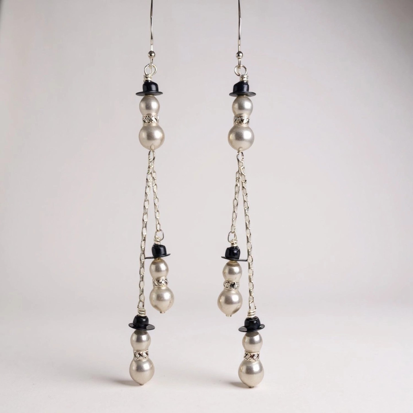 Snowman Trio Christmas Earring Kit👇

🌟 Craft Holiday Cheer with Too Cute Beads
Bring the magic of winter to your ears with the Snowman Trio Christmas Earring Kit from Too Cute Beads! This delightful DIY kit features 4mm and 5mm Swarovski pearls, combined with sterling silver rondells, headpins, eyepins, chain, and ball end ear wires, plus playful black beads for adorable snowman hats. Perfect for beginners, create charming dangle earrings just under 3-Inches long,  in under 20 minutes with a fun wrapping technique. Ideal for holiday gifts or personal festive flair, this kit sparkles with seasonal joy!
💎 Why You’ll Love This Kit
Festive Snowman Design: Features Swarovski pearls and black beads for cute hats.
Premium Materials: Sterling silver components and Swarovski pearls ensure lasting elegance.
Beginner-Friendly: Easy wrapping steps, crafted quickly with included guides.
Handcrafted Quality: Curated by Too Cute Beads for top-tier sparkle.
🌟 What’s Included
4mm and 5mm Swarovski Pearls
Sterling Silver Rondells, Headpins, Eyepins, Chain, and Ball End Ear Wires
Black Beads (for hats)
Printed Step-by-Step Instructions
📦 Shipping
Free U.S. Shipping: On orders over $50, processed in 1-3 business days.
International: Starts at $18.99 (7-21 days).
📱 Stay Connected
Follow us on socials @toocutebeads for holiday inspiration and share with #TooCuteBeads! Join our community for festive tips.
💎 About Too Cute Beads
Since 2005, Too Cute Beads has crafted premium DIY jewelry kits in Farmington, Michigan. Join our newsletter for seasonal discounts!
 https://toocutebeads.com/products/snowman-trio-christmas-earring-kit