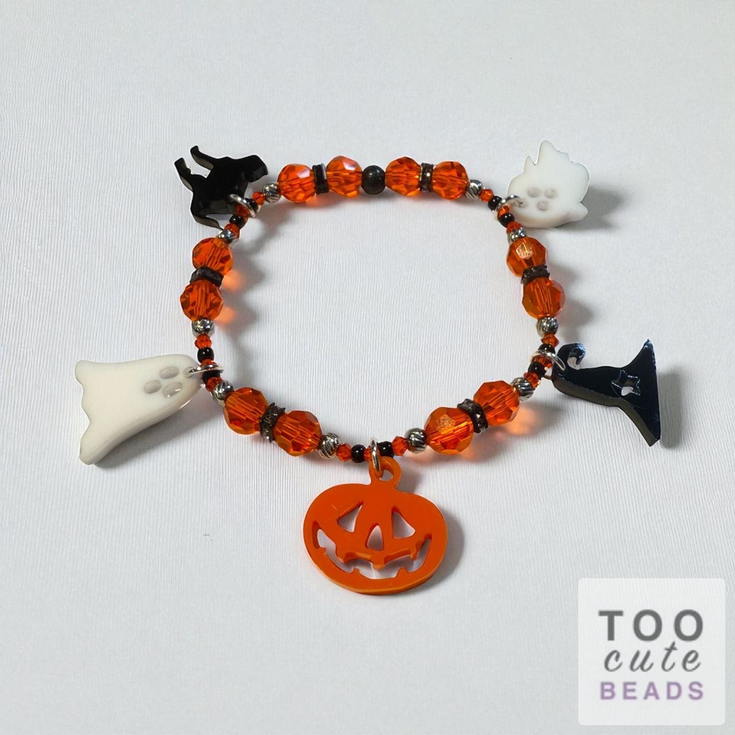 🎃 Craft your own magical moment this Halloween! Unleash your creativity with the Charming Halloween Bracelet Kit for just $19.99! 

✨ What’s inside: 
🕷️ 5 adorable Halloween-themed acrylic charms 
🖤 Black round seed beads 
🍊 8mm orange crystal beads 
💎 .925 sterling silver jump rings 

Perfect for beginners! Assemble a festive bracelet in just 15 minutes with included instructions. 🎉 

Don't miss out on the fun—get yours now: https://ssdlr.shop/l/50697203 

#TooCuteBeads #HalloweenCrafts #DIYJewelry #BeadArt #CraftingFun
