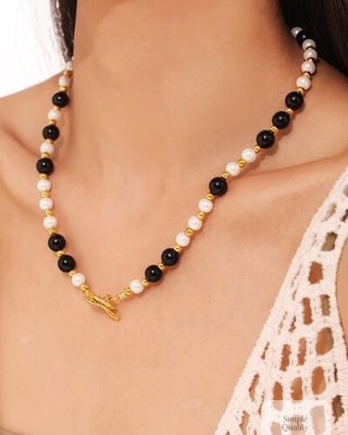Transform your look with a touch of elegance! ✨ 

Our Stainless Agate Shell Bead Necklace combines 18K gold-plated accents with durable stainless steel. Perfect for adding a chic flair to any outfit, it’s a statement piece that speaks sophistication. 

Shop now: 
https://simplequality.org/products/stainless-agate-shell-bead-necklace 

#JewelryDesign #FashionAccessories #EleganceRedefined